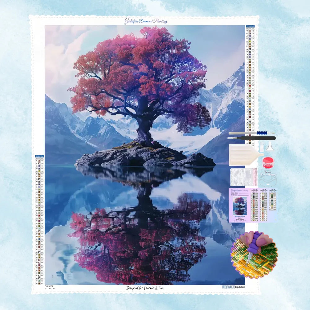 5D Diamond Painting Motiv: Ein leuchtend pinkfarbener Baum auf einer Felseninsel im Bergsee mit perfekter Spiegelung und Schneegipfeln.